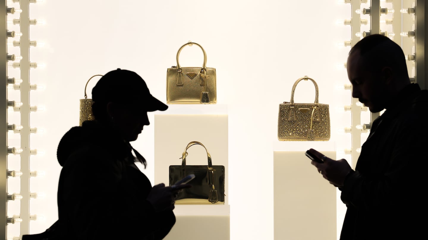 Prada handbags on display at the Prada store on Rome's famous shopping street Via Condotti in Rome.