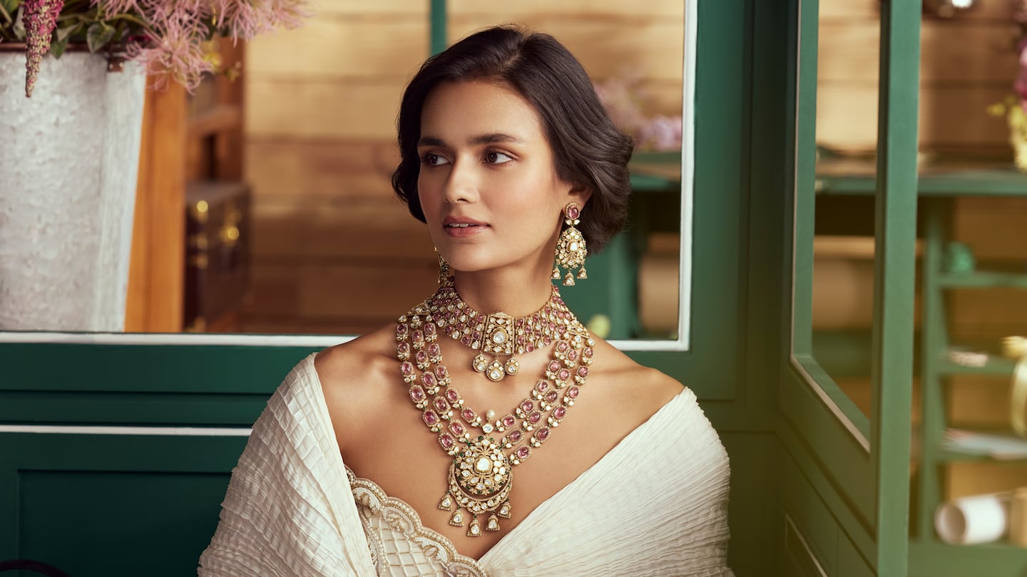 Hazoorilal Legacy’s Spring/Summer 2025 campaign featuring a polki necklace set with pink tourmalines paired with emeralds and diamonds.