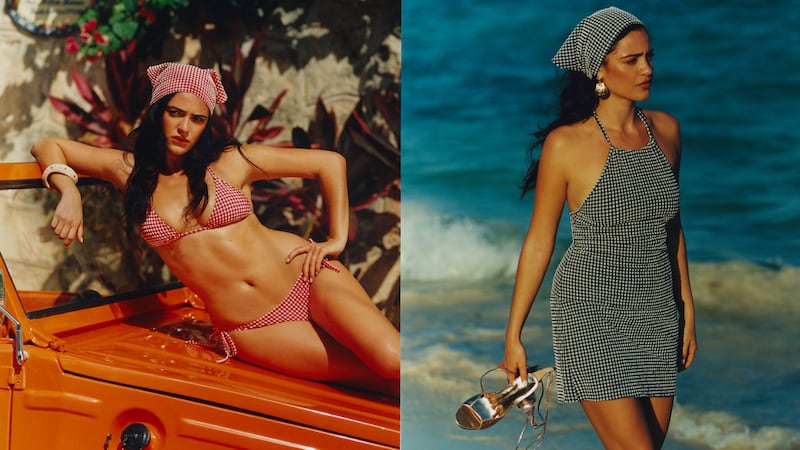 A model in a red gingham Hunza G bikini poses on the hood of a car, while another in a black gingham dress strolls on a beach.