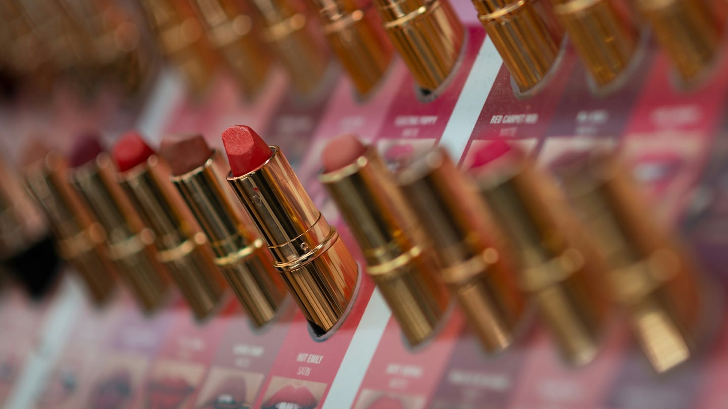 Row of lipsticks in a store.